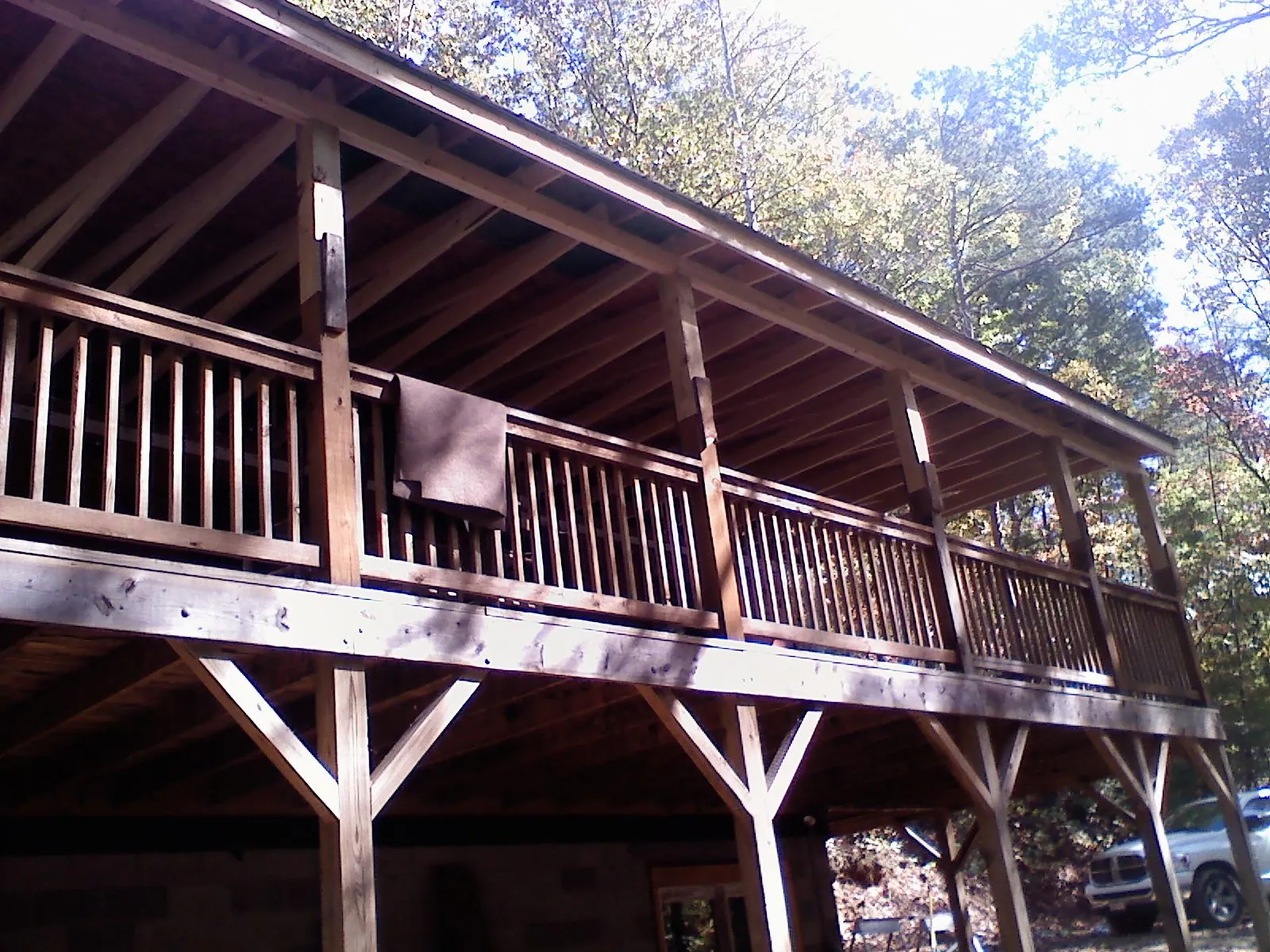 Timber framing under a new elevated porch and deck — Roof Leak Repair in Beverly by Roofing Brothers